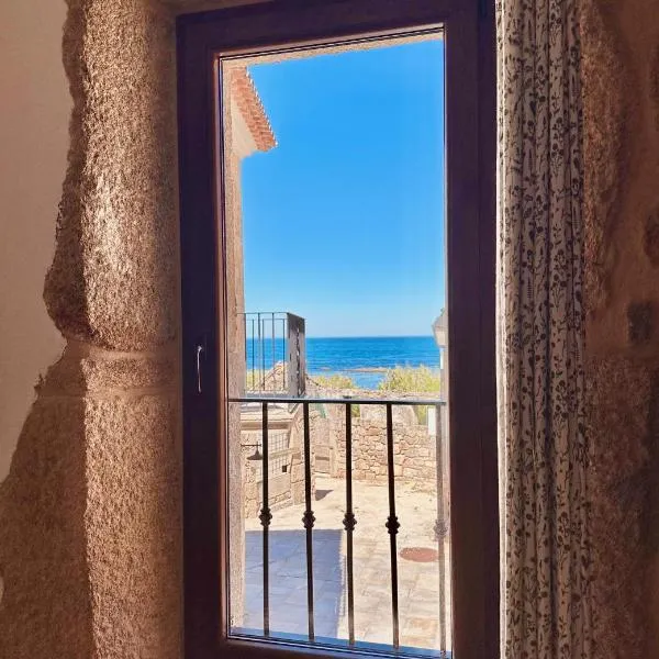 Teresa Caeiro, hotel i Oia