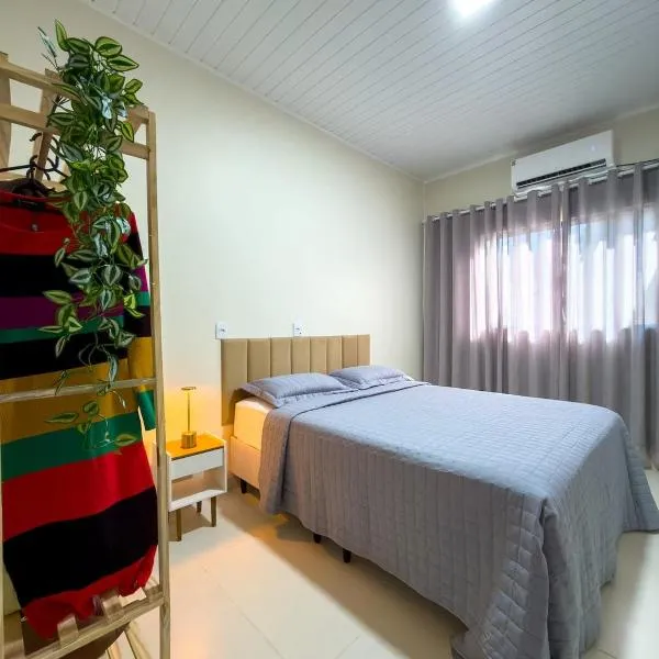 Casa 04 - Nova e moderna 5 minutos do centro, hôtel à Alta Floresta