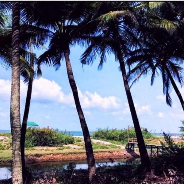 Samant Beach Resort, hotel en Malvan