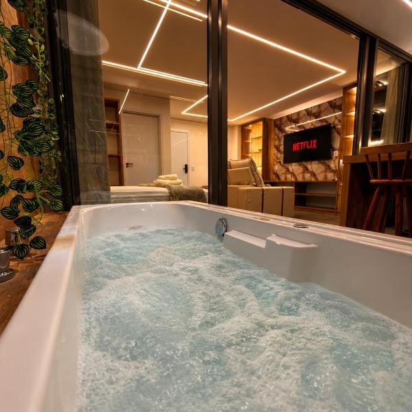 Apartamento com Jacuzzi Privativa