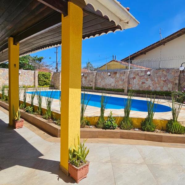 Casa com Piscina Aquecida para até 14 pessoas 600 m da Praia