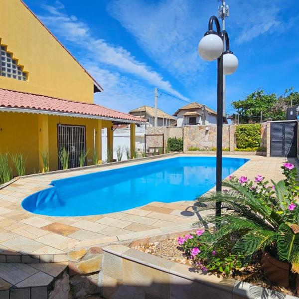 Casa com Piscina Aquecida para até 14 pessoas 600 m da Praia - Foto 3