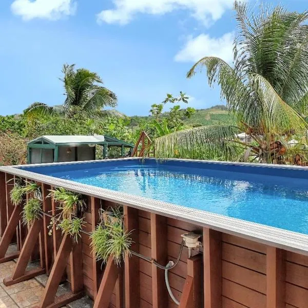 Appartement confortable à Le François avec piscine partagée, hotel en Le François
