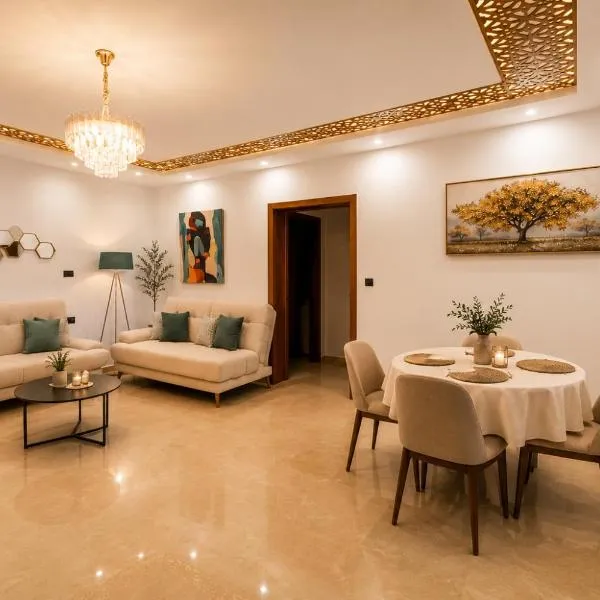 Charming 2-Bedroom Apartment with Garden View Balcony, hotel in Hammamet
