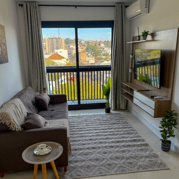 Charmoso apartamento disponível no ai r bn b com garagem a 5 min dos Freeshops