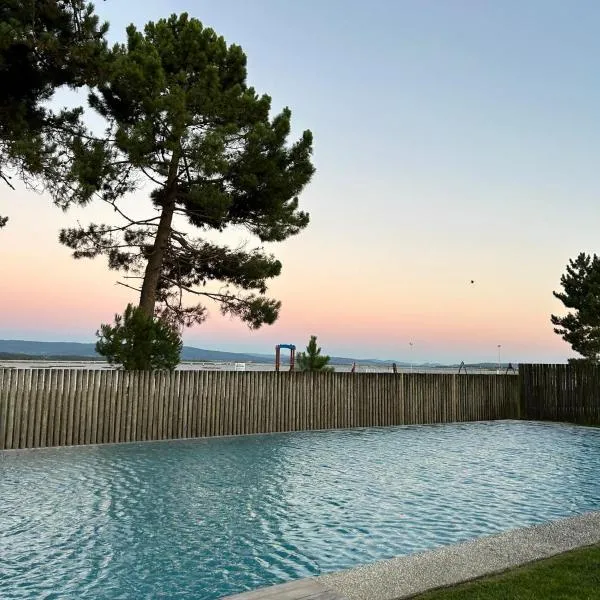 Apartamento playa Illa de Arousa, hotel em Isla de Arosa