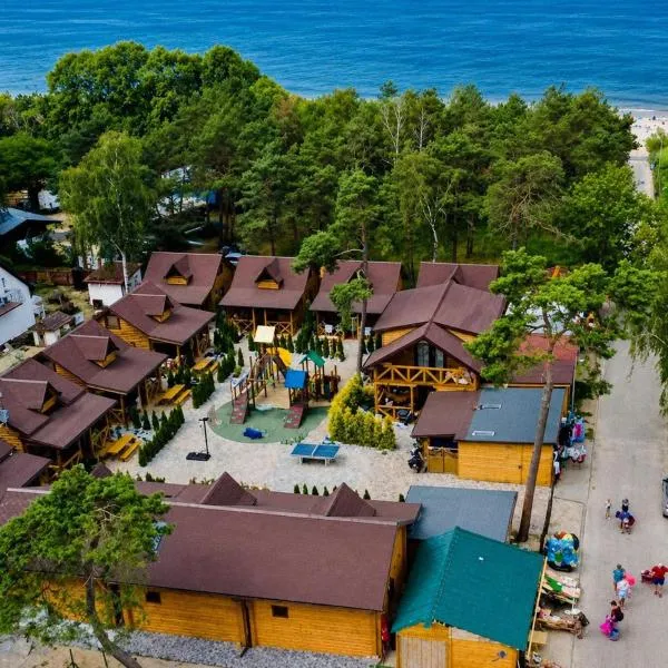 Domy z Bala przy plaży- Domki klimatyzowane - JACUZZI, SAUNA, lody, popcorn, ryba wedzona i ognisko gratis-od maja!, hotel a Dziwnówek
