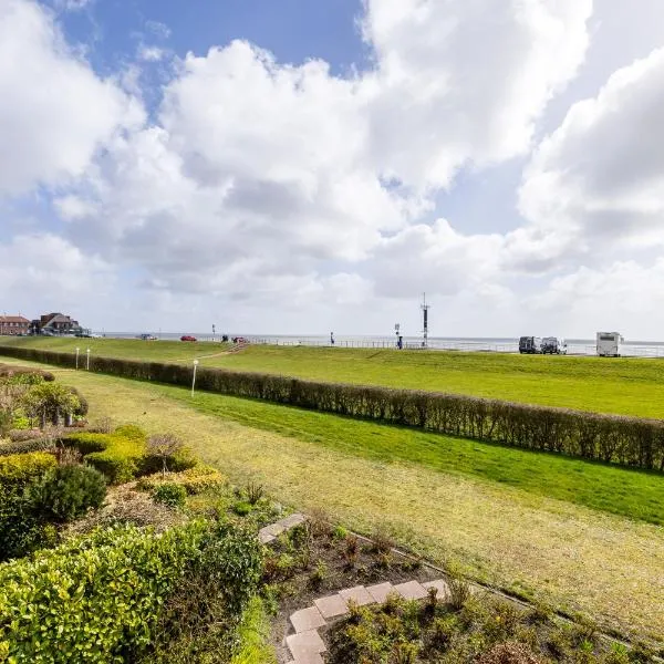Komfortable Ferienwohnung für 2 am Südstrand mit Wintergarten & Meerblick Wohnung 12, hotel in Wilhelmshaven