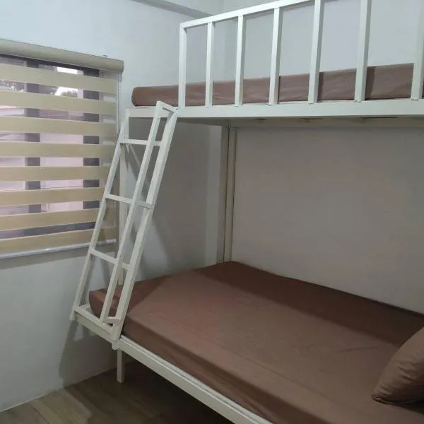 DVM Transient Inn by RedDoorz, hotel en Santo Tomás