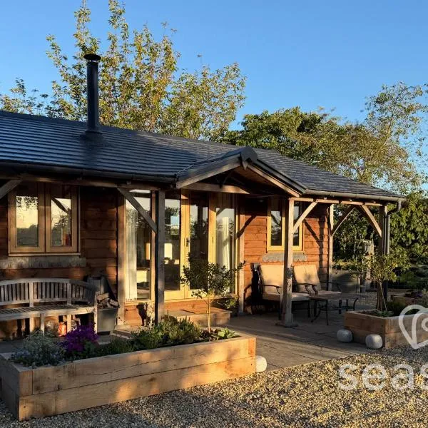 The Gatehouse Lodge Farm Stay, Distant Sea Views, viešbutis mieste Dilis
