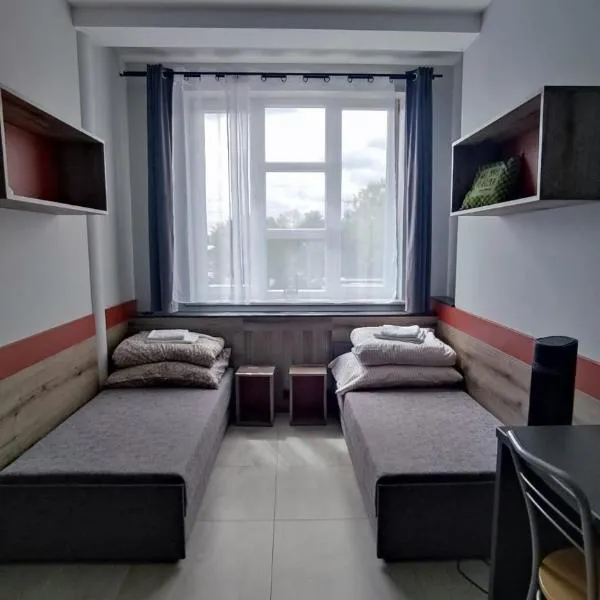 Apartament Spoko Room 22 Szczytno، فندق في شتشتنو