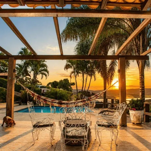 Casa com Vista inigualável "Vista del Lago", хотел в Капитолио