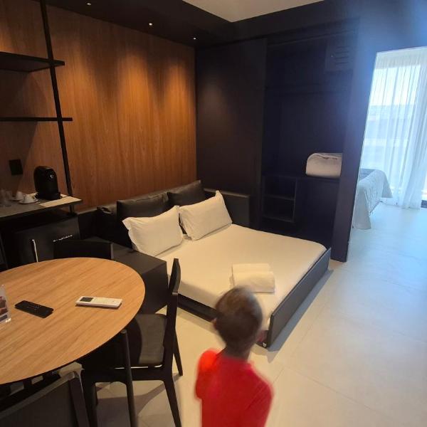 Apartamento em resort pé na areia