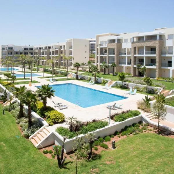 Plage Des Nations Apartment, hotel in Sidi Bouqnadel