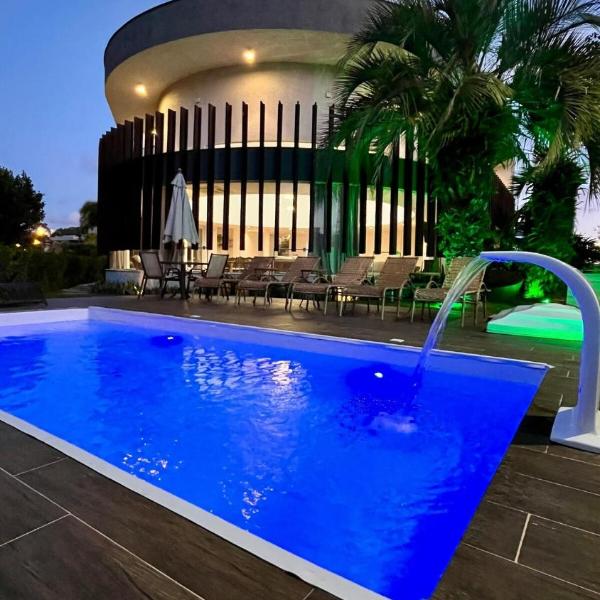 Casa com 5 suites e piscina aquecida