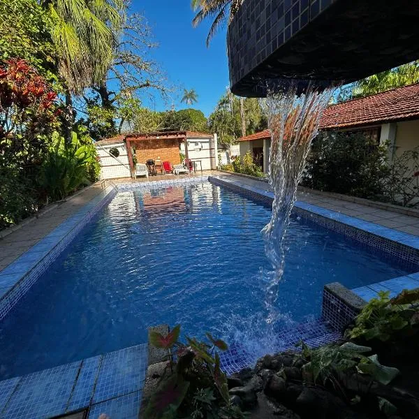 Chacara c piscina ampla em Pedro de toledo, hôtel à Pedro de Toledo