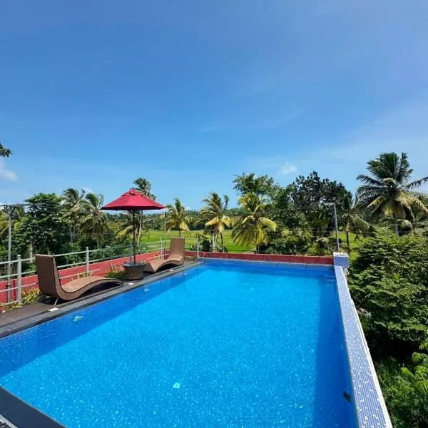 Feather Villa، فندق في تالبي