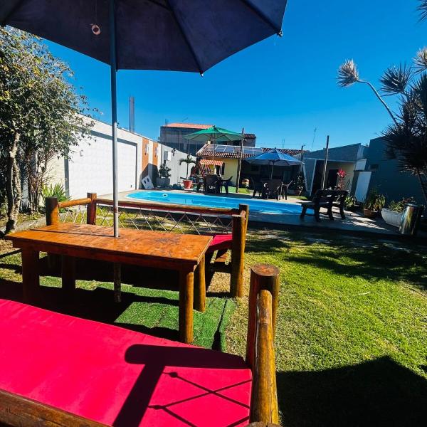 Casa de Praia com piscina, churrasqueira, fogão a lenha, espaço kids e sala de jogos