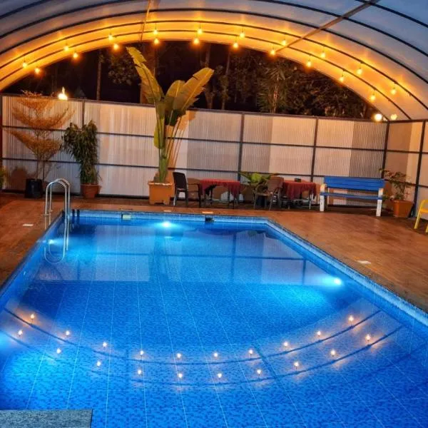 Paddyfield Inn, hotel em Mananthavady