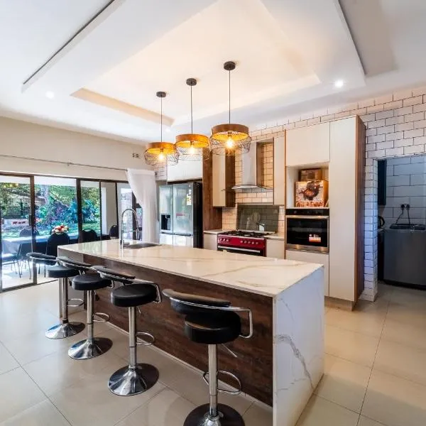 Cosmo Guest House, hotel din Victoria Falls