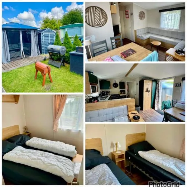 Chalet Meerwijck mit Terrasse am Wasser mit Strand und Schwimmbad, хотел в Kropswolde