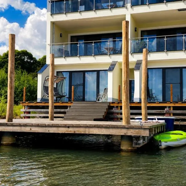 Hainer See - Ferienhaus Seeblick mit eigenem Steg direkt am Wasser, hotel in Kahnsdorf