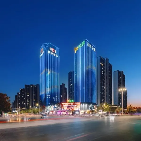 常德喆啡酒店万达广场文理学院店, отель в Чандэ