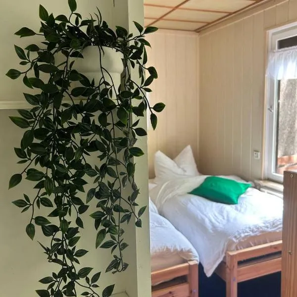 Einfaches Ferienhaus mit Garten und ursprünglichem Retro-Charakter in Schöneiche bei Berlin โรงแรมในSchöneiche
