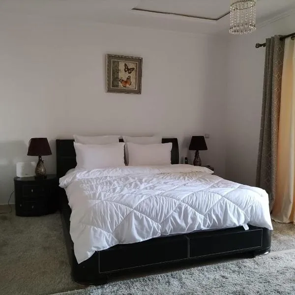 Villa Harmonie - Suite Deluxe avec Terrasse, хотел в Кемисет