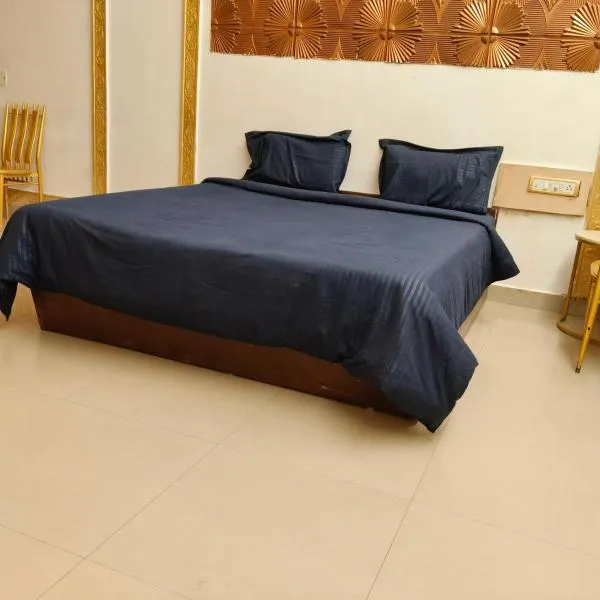 Adory homes inn, hotell i Kelambākkam