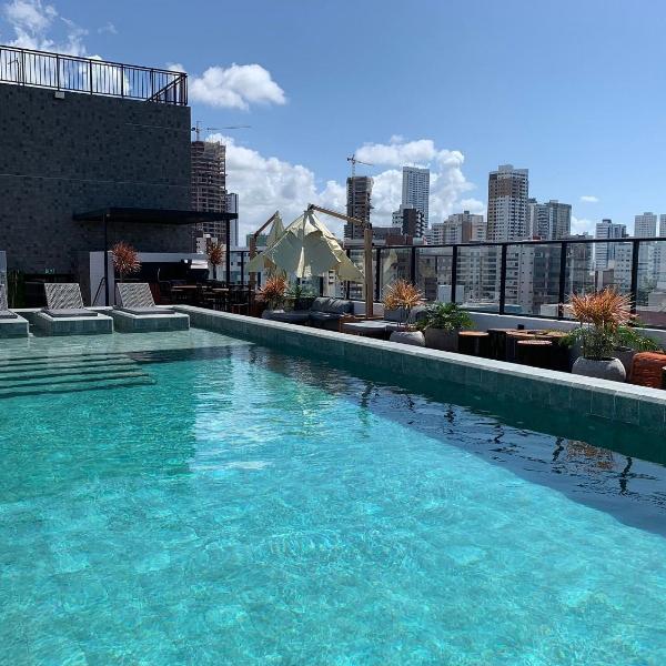 Flat espaçoso e confortável a 50m da praia