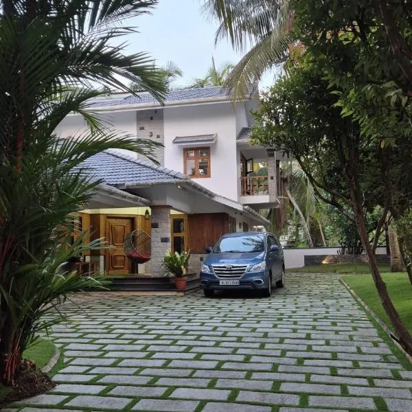 Thistle Cosy Villa, hotel di Kozhikode