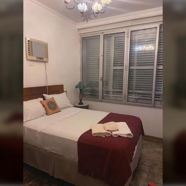 São Vicente: Conforto com Vista Mar e Garagem