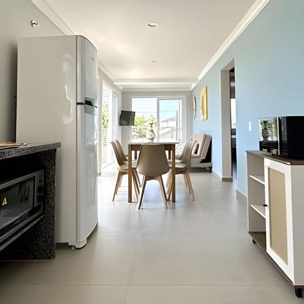 Apartamento com varanda e vista frente mar