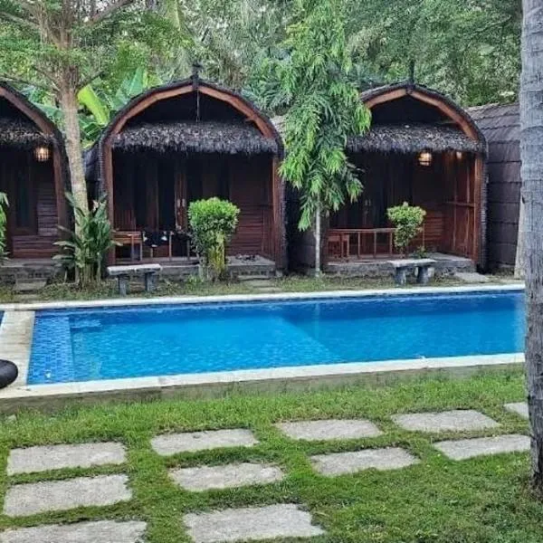 Awang Homestay Mandalika & Restaurant, hotel en Bumbang