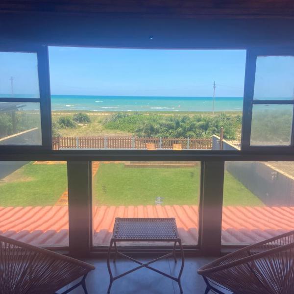 Sunrise Beach House - Casa pé na areia em condomínio
