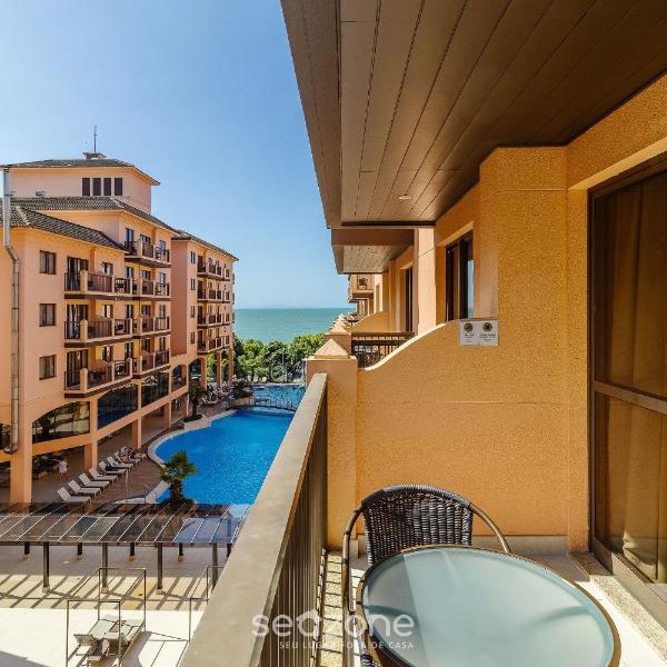 Suíte com bela vista para o mar e piscina em Jurerê JBV248