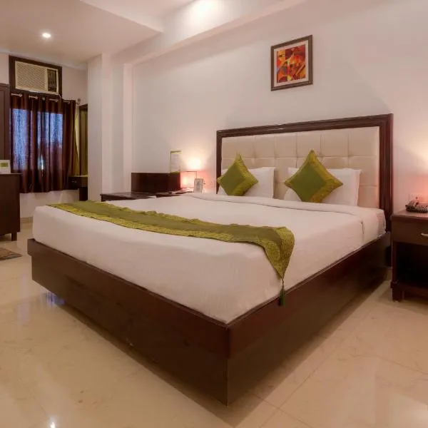 Treebo Trend Shivam Inn, hotel en Hasanganj