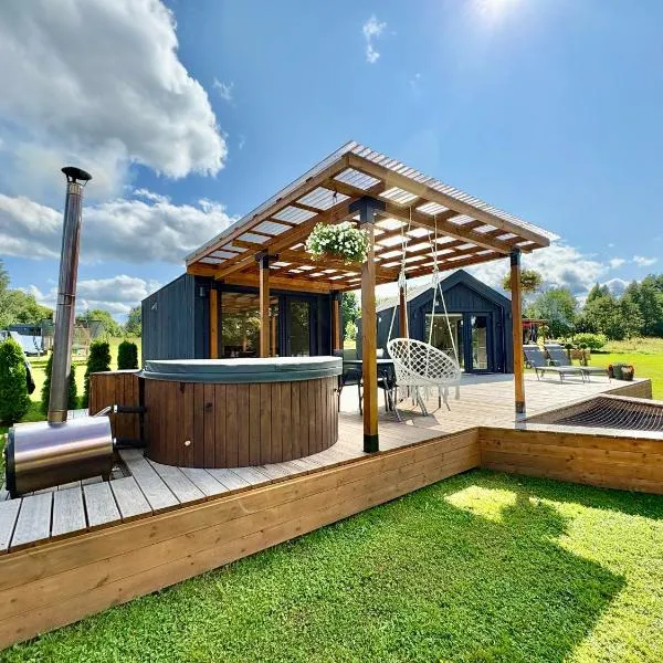 Rātes Krasti - PĒRLE- holiday house with sauna and lakeview, hotell sihtkohas Lejasciems