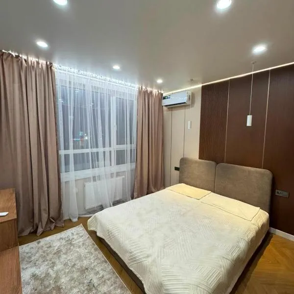Arena City - уютная квартира рядом с Алматы Ареной, hotel i Almaty