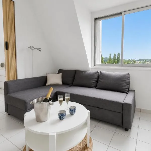 Appartement lumineux avec chambre ouverte, parking, proche plage، فندق في تورجفيل