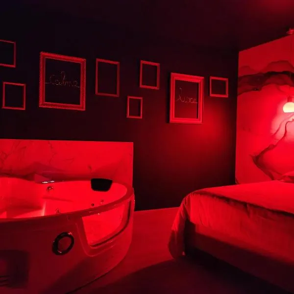 La Volupté - Love room avec Jacuzzi - Sauna, hotel in Doué-la-Fontaine