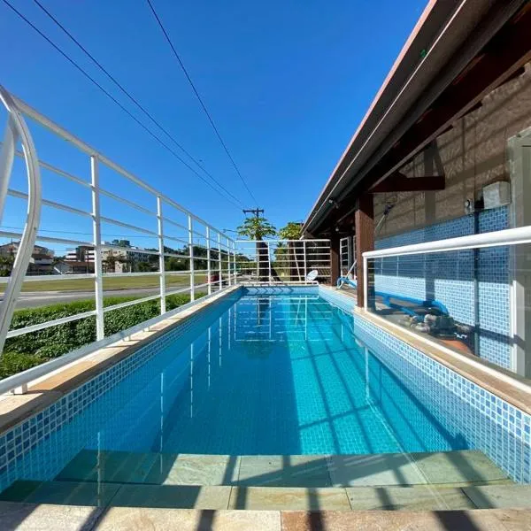 Pousada Werneck Residence Suites، فندق في أوباتوبا
