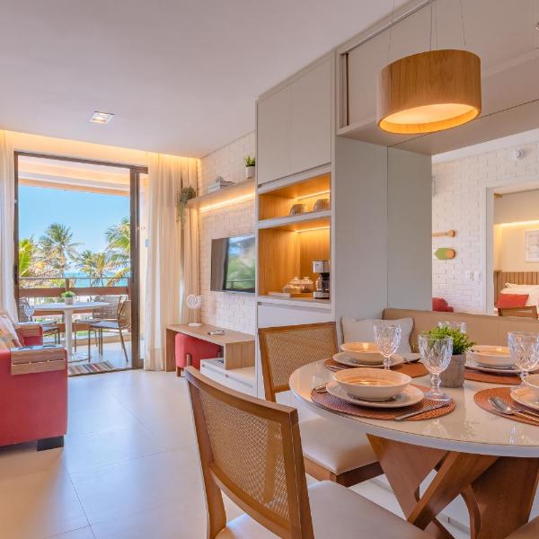 Apartamento FRENTE MAR e PÉ NA AREIA em Resort ao lado do Parque Aquático