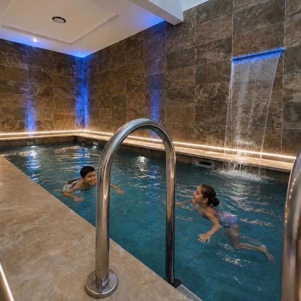Maison de Prestige avec Piscine Privee avec la clim dans toutes les chambres Ideale pour des Vacances en Famille，位于乌季达的酒店