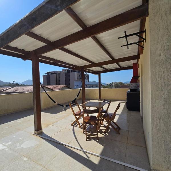 Casa de praia 150 mts do mar - suítes com ar e churrasqueira no terraço - piscina compartilhada