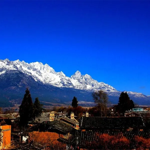 Lijiang Baisha Free Time Designed Hotel, хотел в Longpan