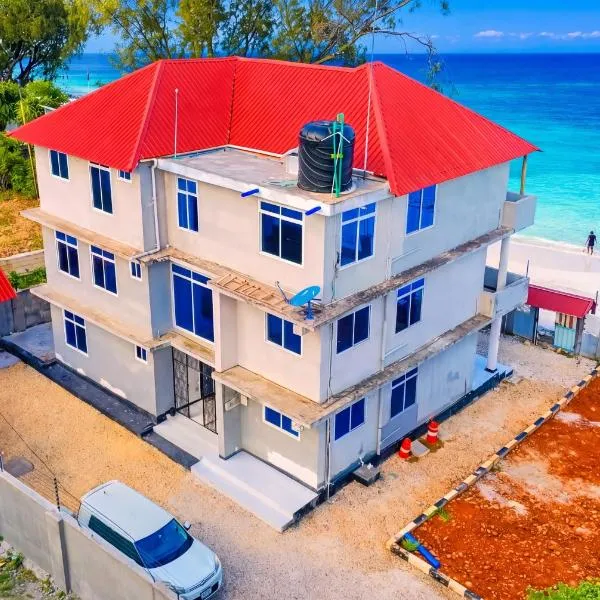 Uroa Beachfront 2BR Apartment with Sea View, отель в Ероа