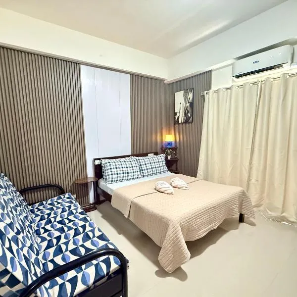 Cozy condo unit 5mins from Mactan Cebu Int'l Airport with Netflix, ξενοδοχείο σε Μακτάν