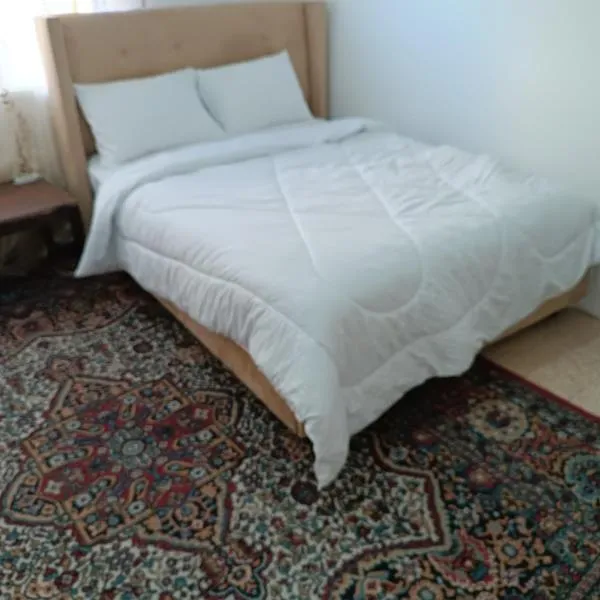 Room in central Amman, hôtel à Amman